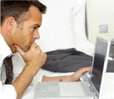 Click on the laptop to see program features, sample reports, and sample time cards.